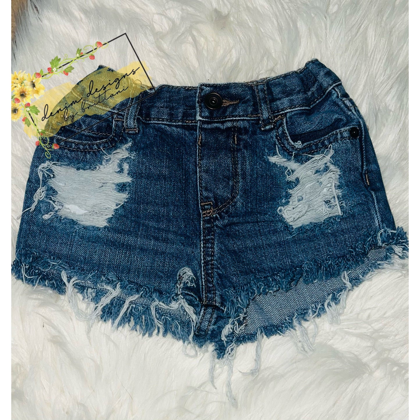 Size 4T distressed shorts
