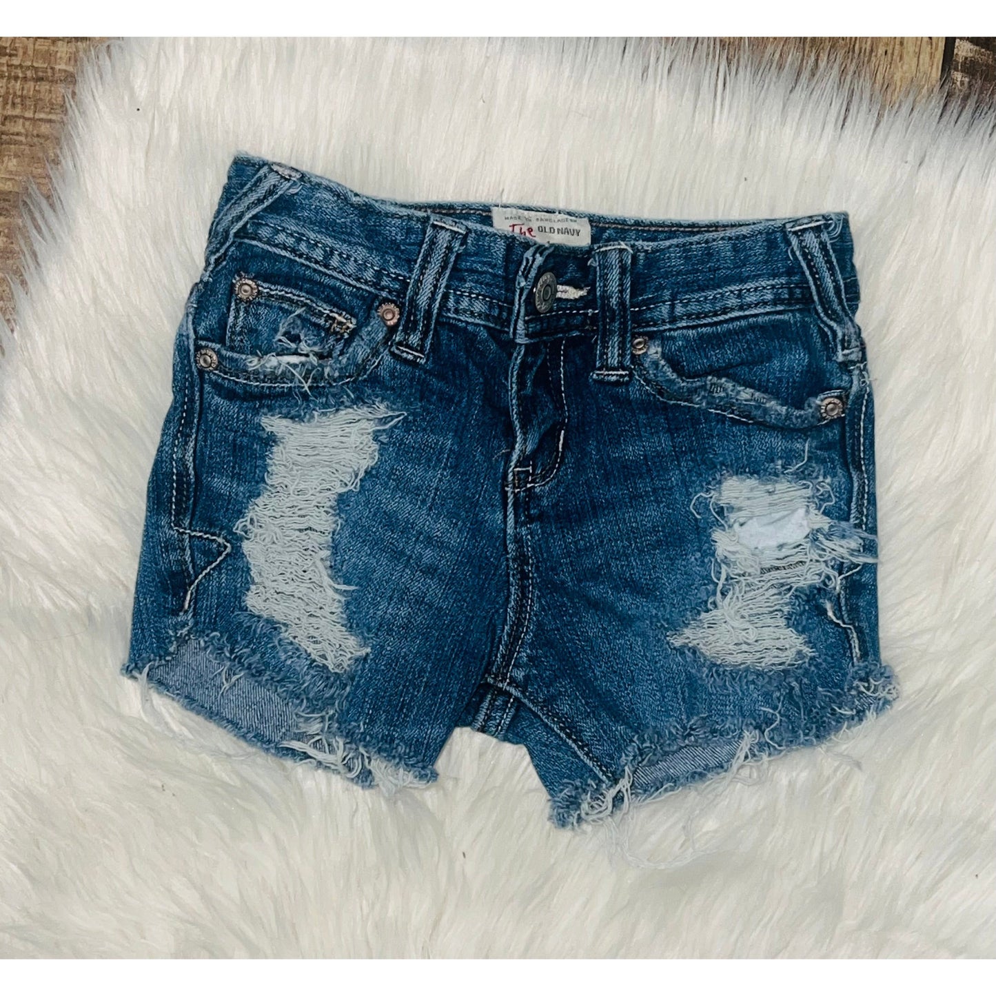 Size 7 slim distressed shorts