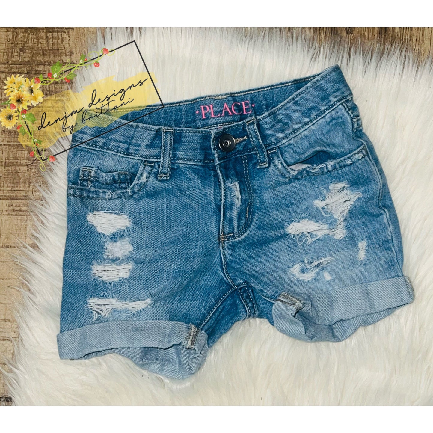 Size 4 distressed shorts